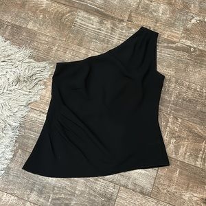 EUC WHBM Sz 6 one shoulder black top. Liked with no stretch